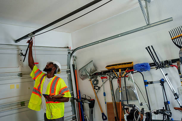 Professional Garage Door Installation technician working in Manhattan, KS